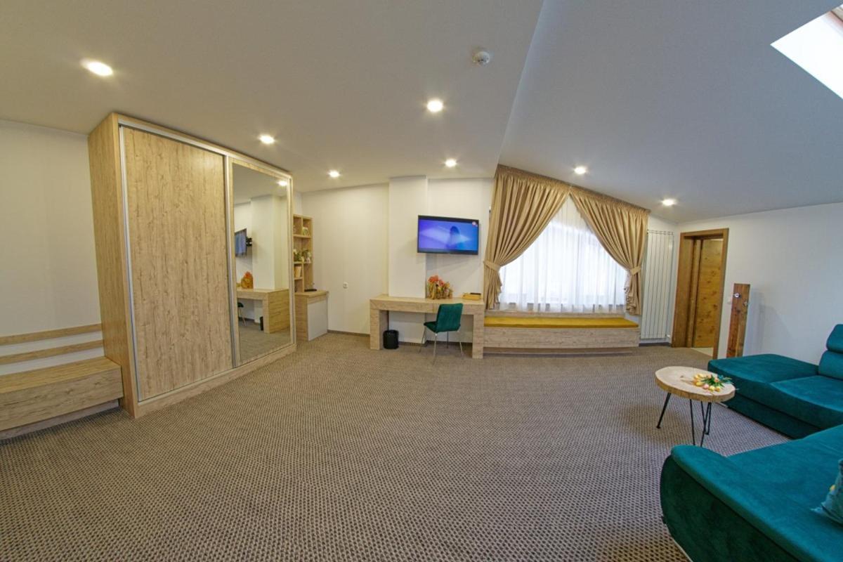 Aquarius Boutique Hotel Кымпулунг-Молдовенеск Номер фото